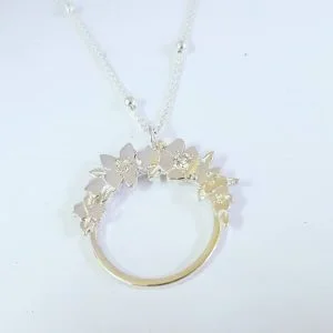 Sterling Silver Flower Pendant on Beaded Chain.